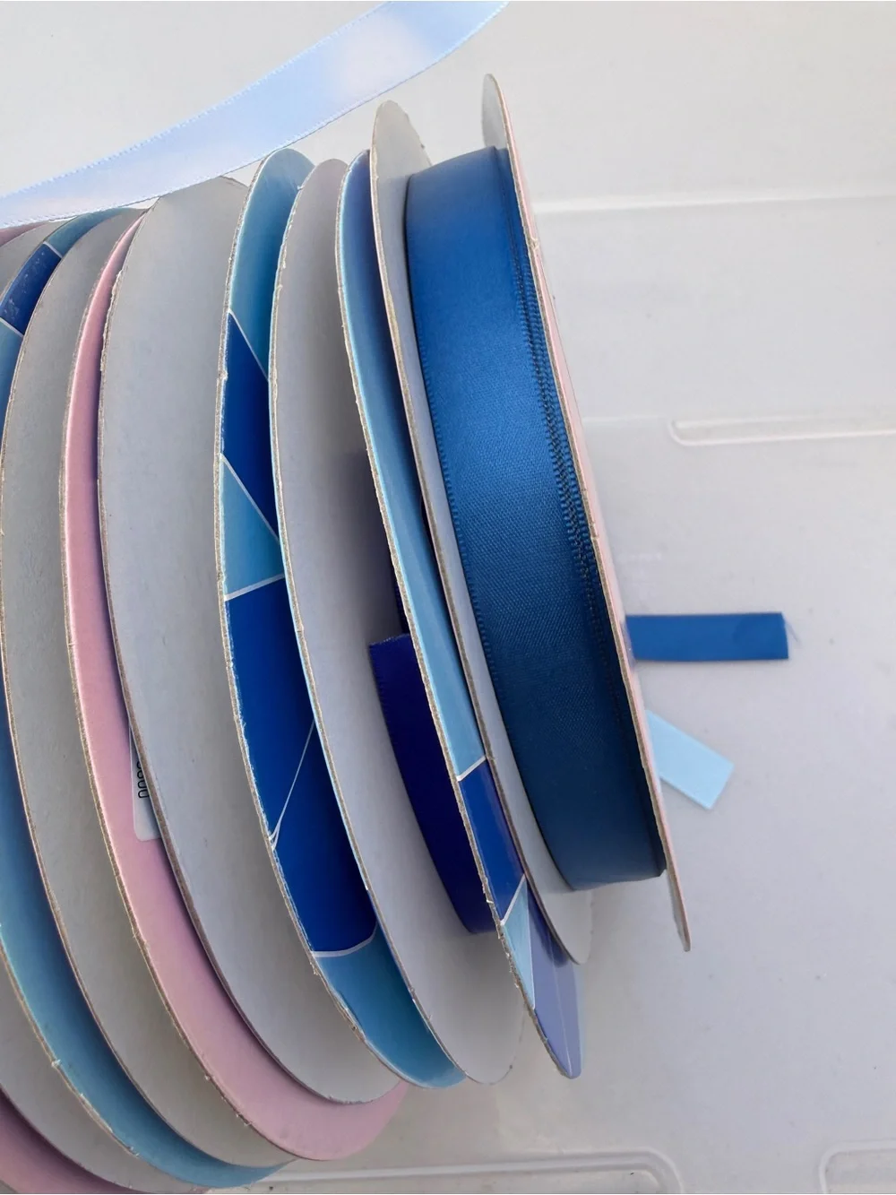 Assorted Satin Ribbon Spools in light blue and dark blue